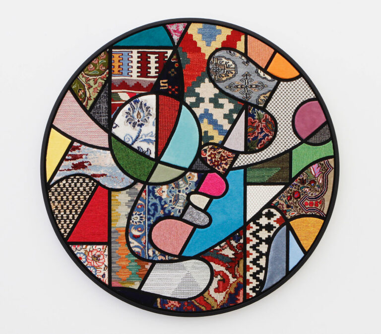 Nevin Aladağ, Social Fabric, compass, 2022, carpet pieces on wood, wooden frame, ø 134 cm, d 4 cm, courtesy Galerie Krinzinger and the artist